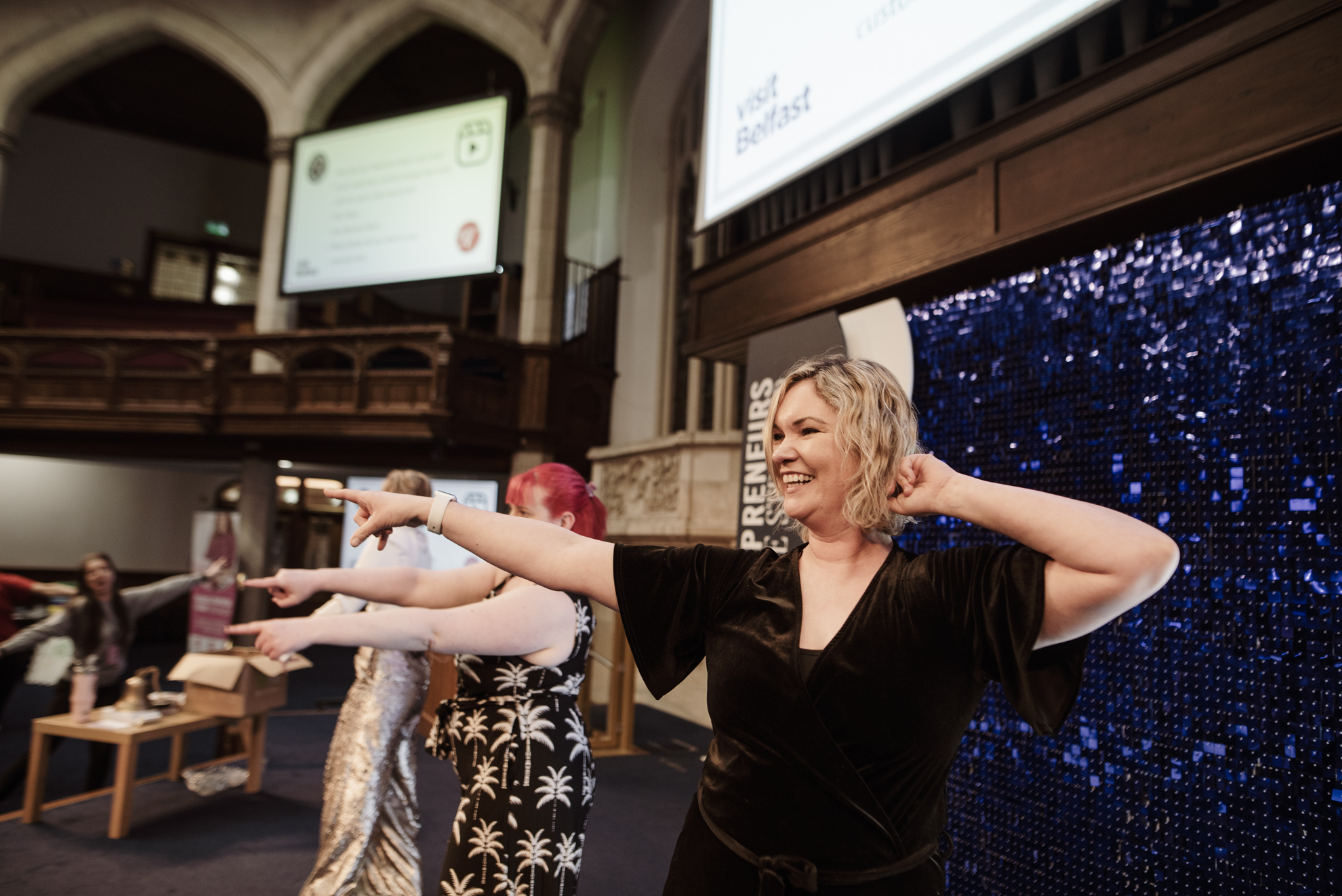 Attendees enjoying an interactive moment on the main floor